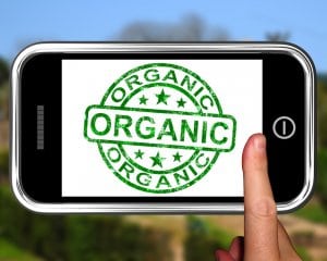 Organic On Smartphone Shows Ecological Products Or Natural Food